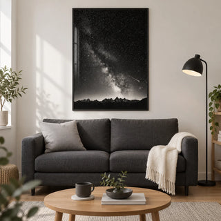 Starry Night Poster, framed on the wall of a modern living room in a UK first flat (22-28) with a soft white wall and oak floor