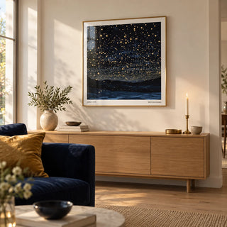 Starry Night Print, framed on the wall of a calm living room with a warm white wall and a pale oak floor