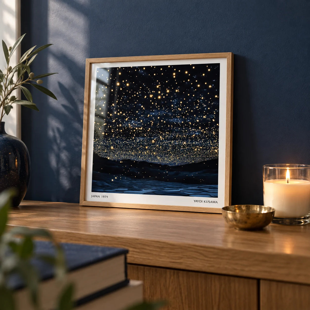 Starry Night Print, a small A4 framed print leaning on an oak shelf in a living room