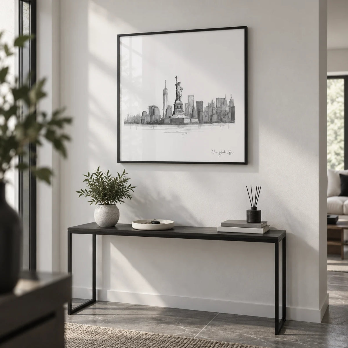 Statue of Liberty Print, framed on the wall of a modern monochrome hallway with a white wall and a grey stone floor