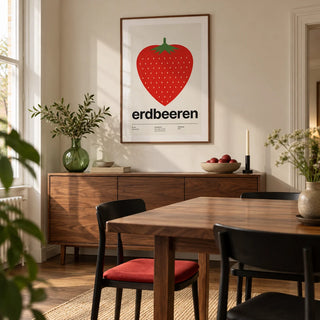 Strawberry Print, framed on the wall of a crisp dining room in a renovated UK terrace with cream walls and a walnut floor