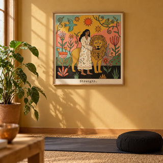 Strength Tarot Card Art, framed on the wall of a meditation corner with a soft ochre painted wall