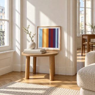 Striped Print, a small square framed print leaning on a small solid oak side table