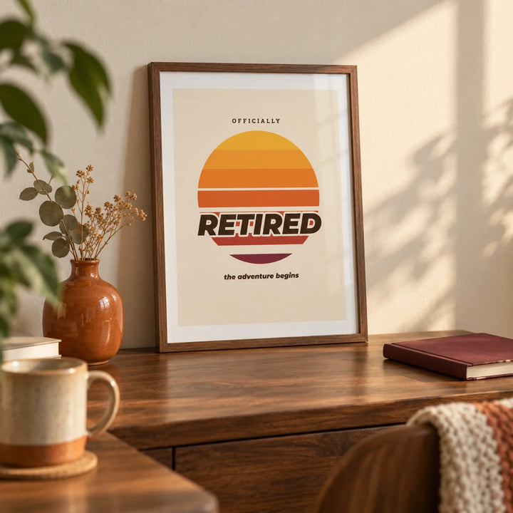 Sunset Poster, a small A4 framed print leaning on a walnut desk