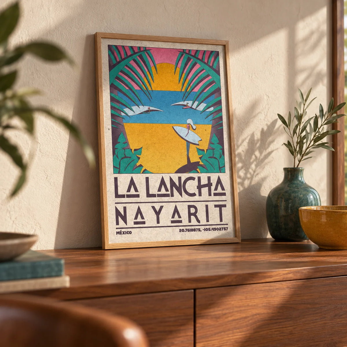 Surfer Beach Art Print, a small A4 framed print leaning on a walnut sideboard in a living room