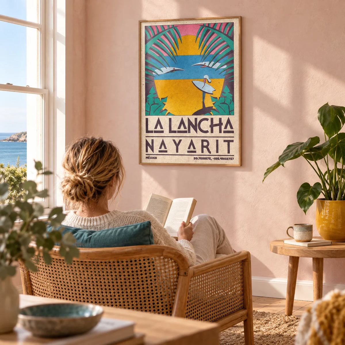 Surfer Beach Art Print, framed on the wall of a sunny reading corner in a UK coastal home with pale pink plaster walls in a living room