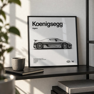 Swedish Hypercar Poster, a small A4 framed print leaning on a black metal shelf in a living room