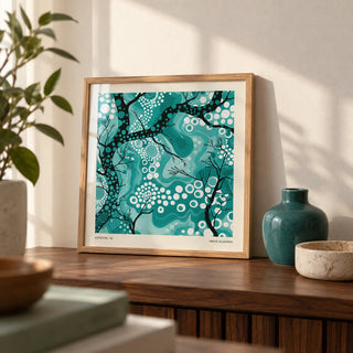 Teal Abstract Wall Art, a small A4 framed print leaning on a walnut shelf in a living room