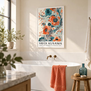 Teal and Orange Wall Art, framed on the wall of a bright modern bathroom with a soft cream wall and plain white tiles