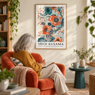 Teal and Orange Wall Art, framed on the wall of a cosy reading corner with a pale cream wall in a living room