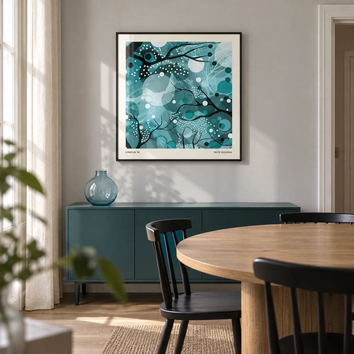Teal Home Decor, framed on the wall of a compact contemporary dining room in a UK apartment with a pale grey wall