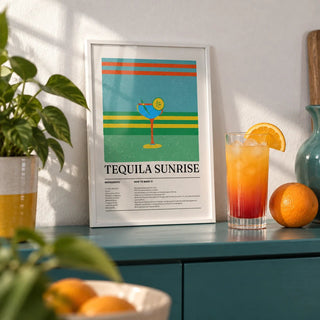 Tequila Wall Art, a small A4 framed print leaning on a teal painted shelf in a living room