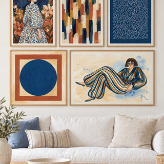 Modern Gallery Wall Set hung at eye level above a white linen sofa: Elegant Floral Portrait, Colorful Block Composition and All My Hearts shown framed side by side (frames not included)