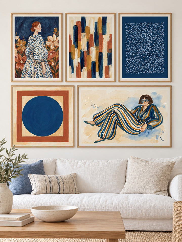 Modern Gallery Wall Set hung at eye level above a white linen sofa: Elegant Floral Portrait, Colorful Block Composition and All My Hearts shown framed side by side (frames not included)