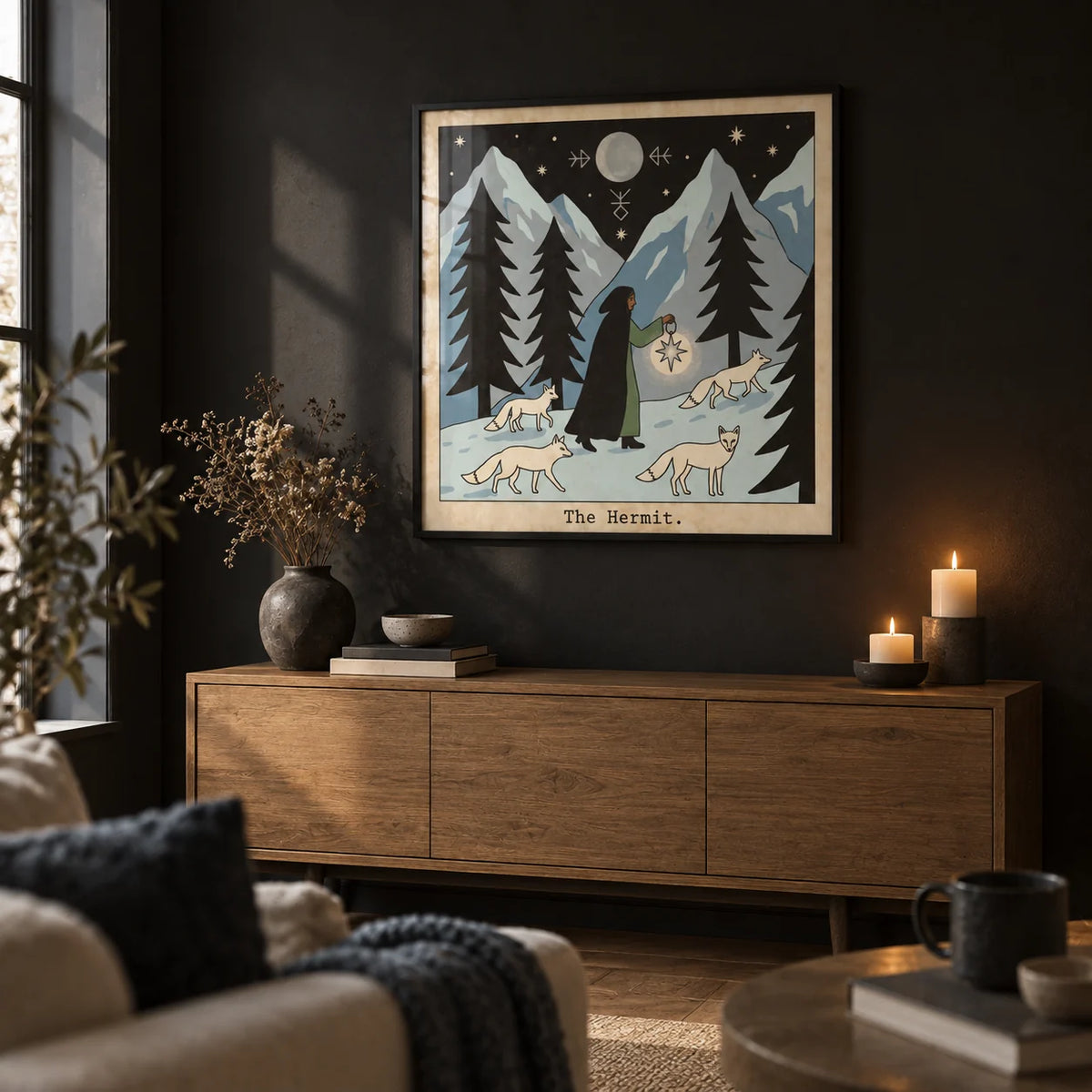 The Hermit Tarot Card Art, framed on the wall of a dark living room with a black painted wall
