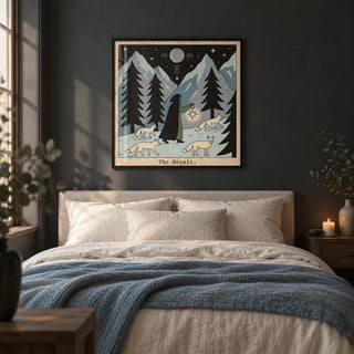 The Hermit Tarot Card Art, framed on the wall of a moody bedroom with a deep charcoal painted wall
