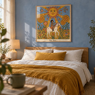 The Sun Tarot Card Art, framed on the wall of a calm bedroom with a soft cornflower blue limewashed wall