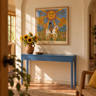 The Sun Tarot Card Art, framed on the wall of a warm hallway with an arched plaster niche