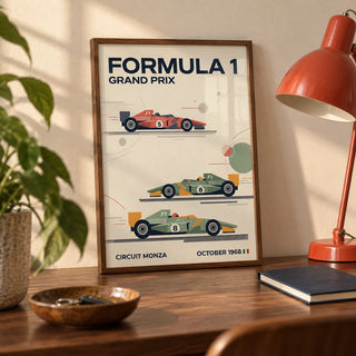 Three Classic Racing Cars Poster, a small A4 framed print leaning on a walnut desk