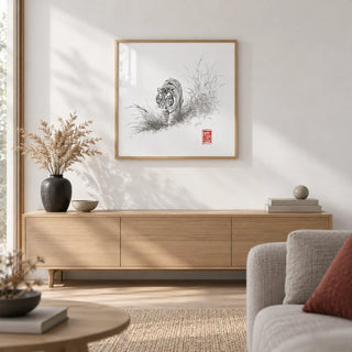 Tiger Ink Painting, framed on the wall of a calm minimal living room with a white wall and a pale oak floor