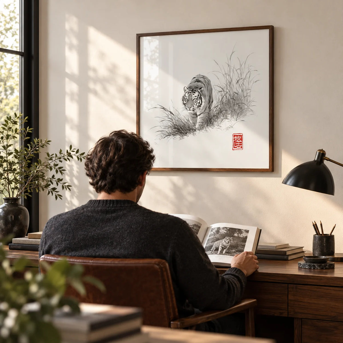 Tiger Ink Painting, framed on the wall of a calm study with a warm white wall