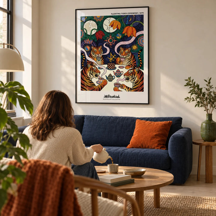 Tiger Tea Ceremony Print, framed on the wall of a design-led living room in a UK city flat with a warm white wall and pale timber floor