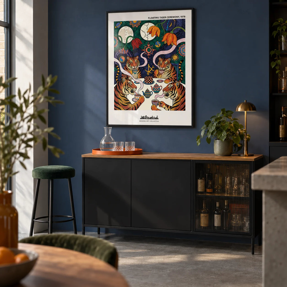 Tiger Tea Ceremony Print, framed on the wall of a modern home bar alcove in a UK open-plan living room with a muted indigo wall and a concrete floor