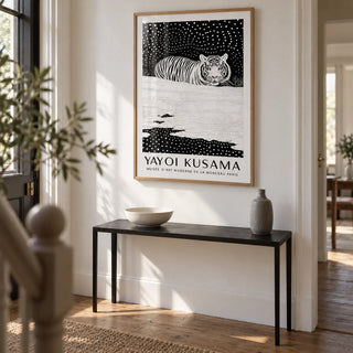 Snow Tiger Print, framed on the wall of a bright entrance hallway in a renovated UK terrace with a white wall and warm timber floorboards