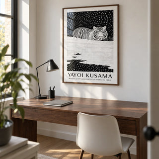 Snow Tiger Print, framed on the wall of a compact modern home study with a white wall and a walnut desk