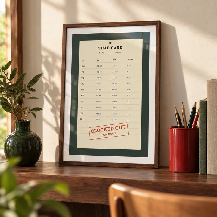Time Card Print, a small A4 framed print leaning on a walnut shelf in a living room