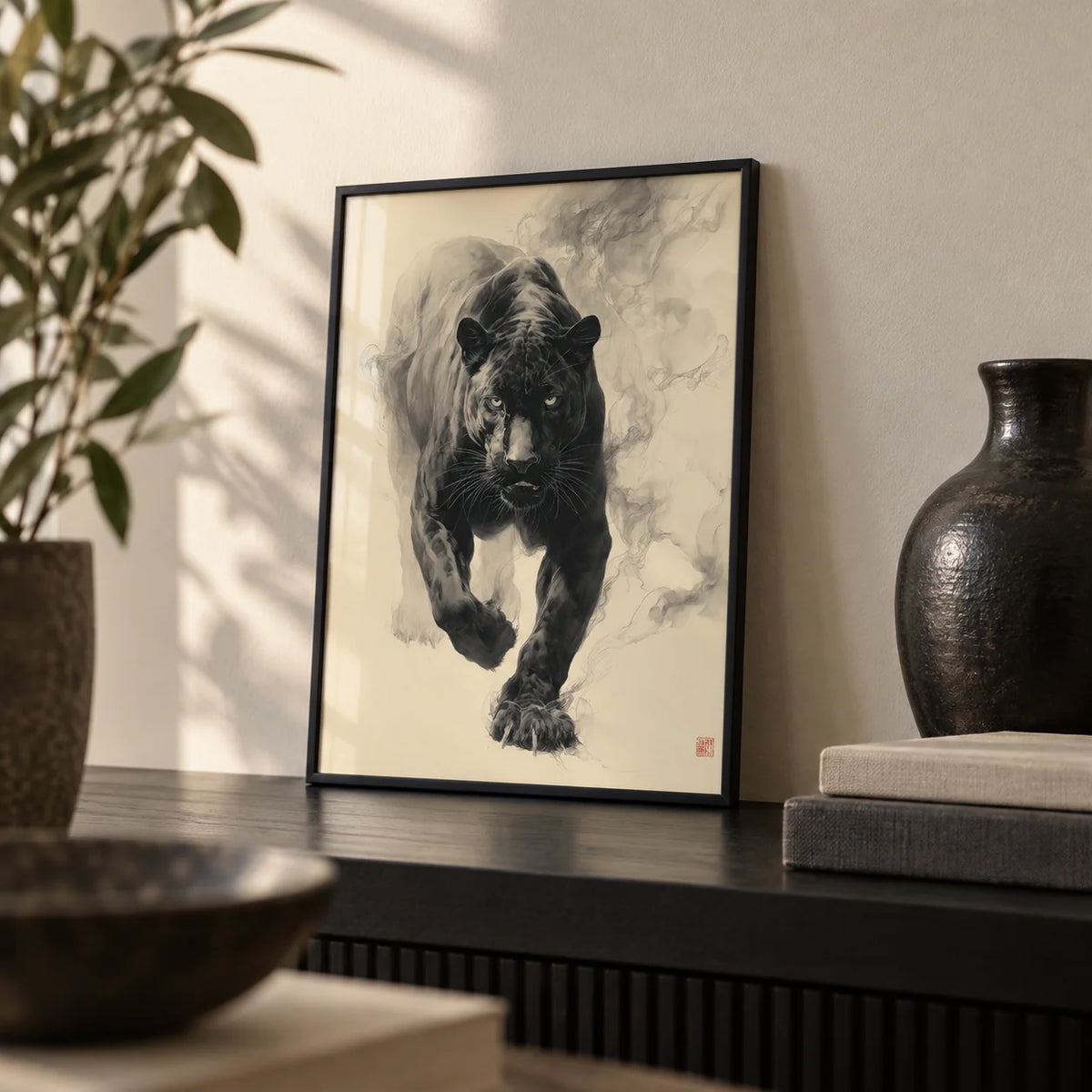Traditional Japanese Ink Art, a small A4 framed print leaning on a black shelf in a living room