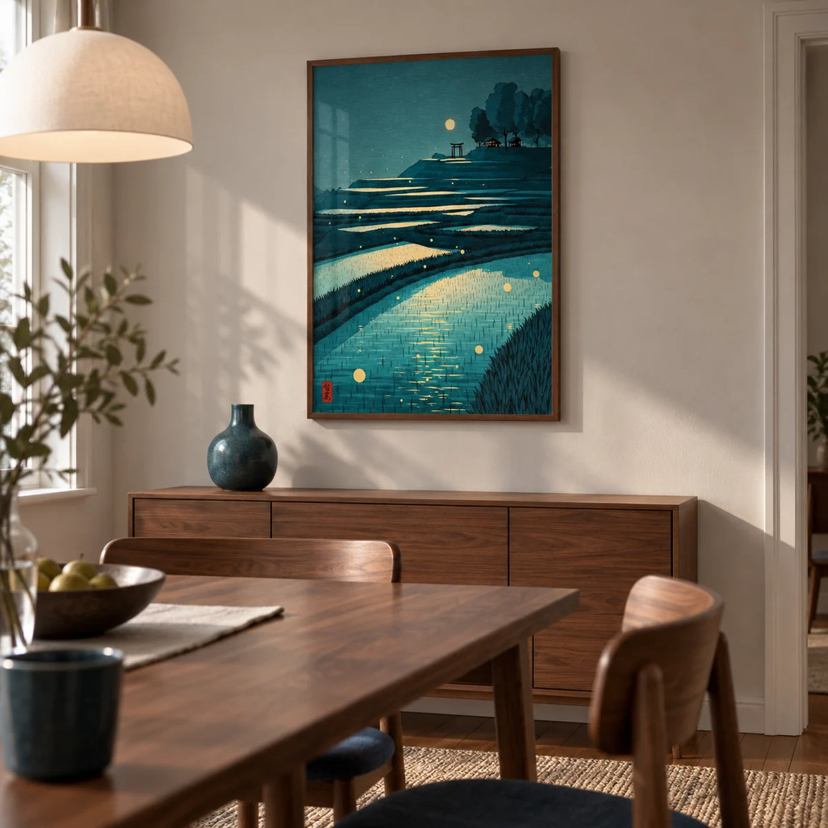 Tranquil Rice Field Poster, framed on the wall of a compact contemporary dining room in a UK flat with pale warm grey walls and a walnut dining table