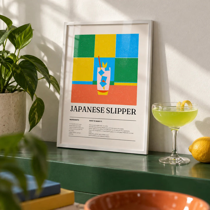 Trendy Wall Art, a small A4 framed print leaning on a green painted shelf in a living room