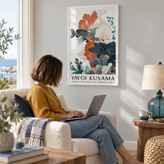 Tropical Fish Poster, framed on the wall of a reading corner in a coastal house with a pale grey wall in a living room