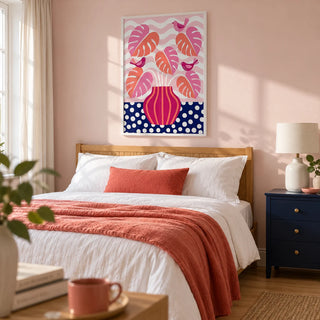 Tropical Plant Wall Art, framed on the wall of a modern bedroom in a UK terraced home with a pale blush wall and light oak flooring