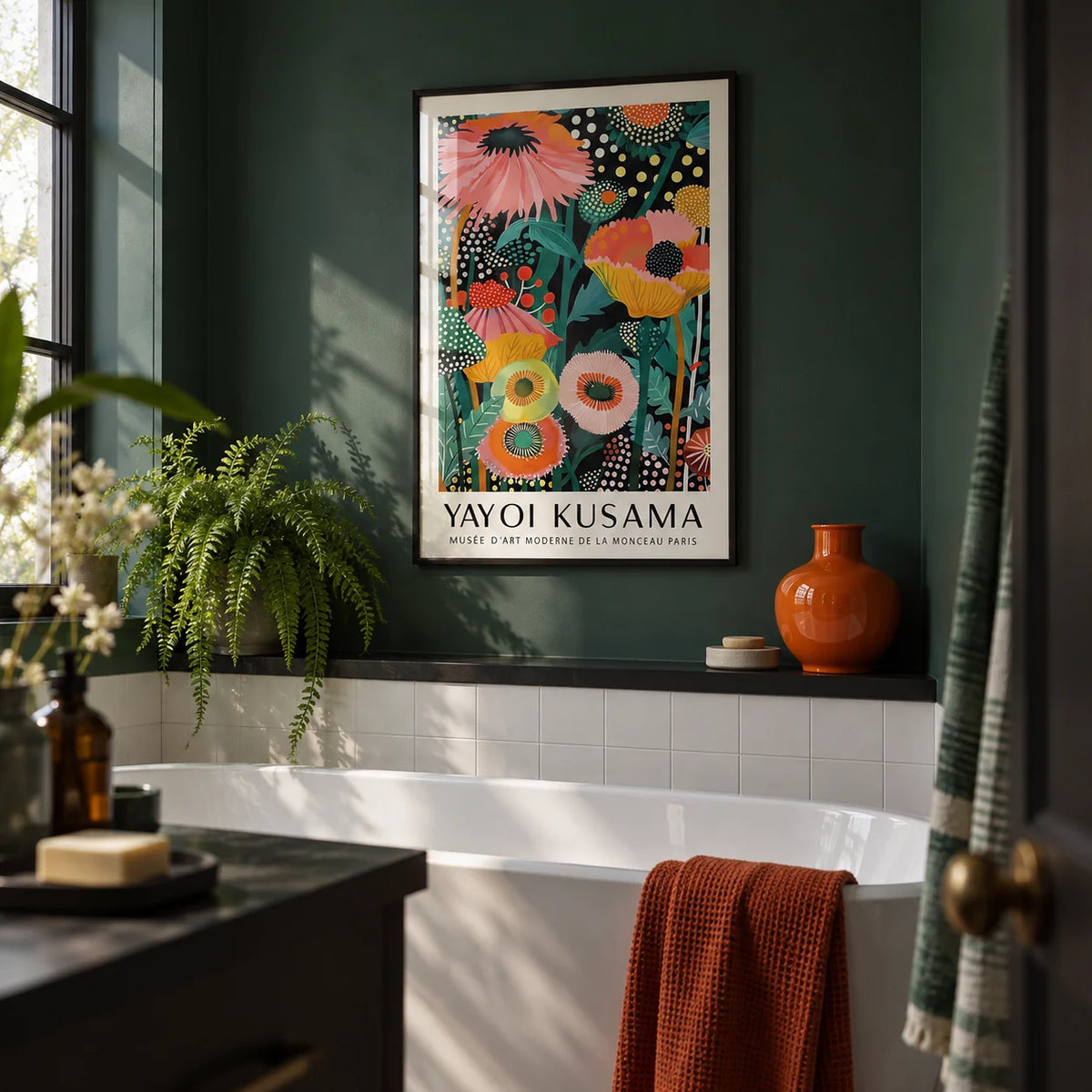 Tropical Wall Art, framed on the wall of a dark bathroom with a deep green painted wall and plain white tiles