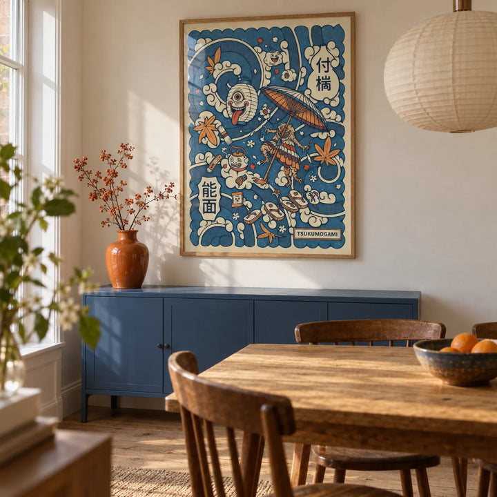 Tsukumogami Art, framed on the wall of a warm modern dining room in a UK terraced house with cream walls and simple oak floorboards