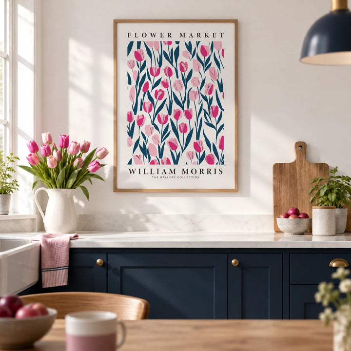 Tulip Decor, framed on the wall of a bright kitchen with plain navy cabinets and a white worktop