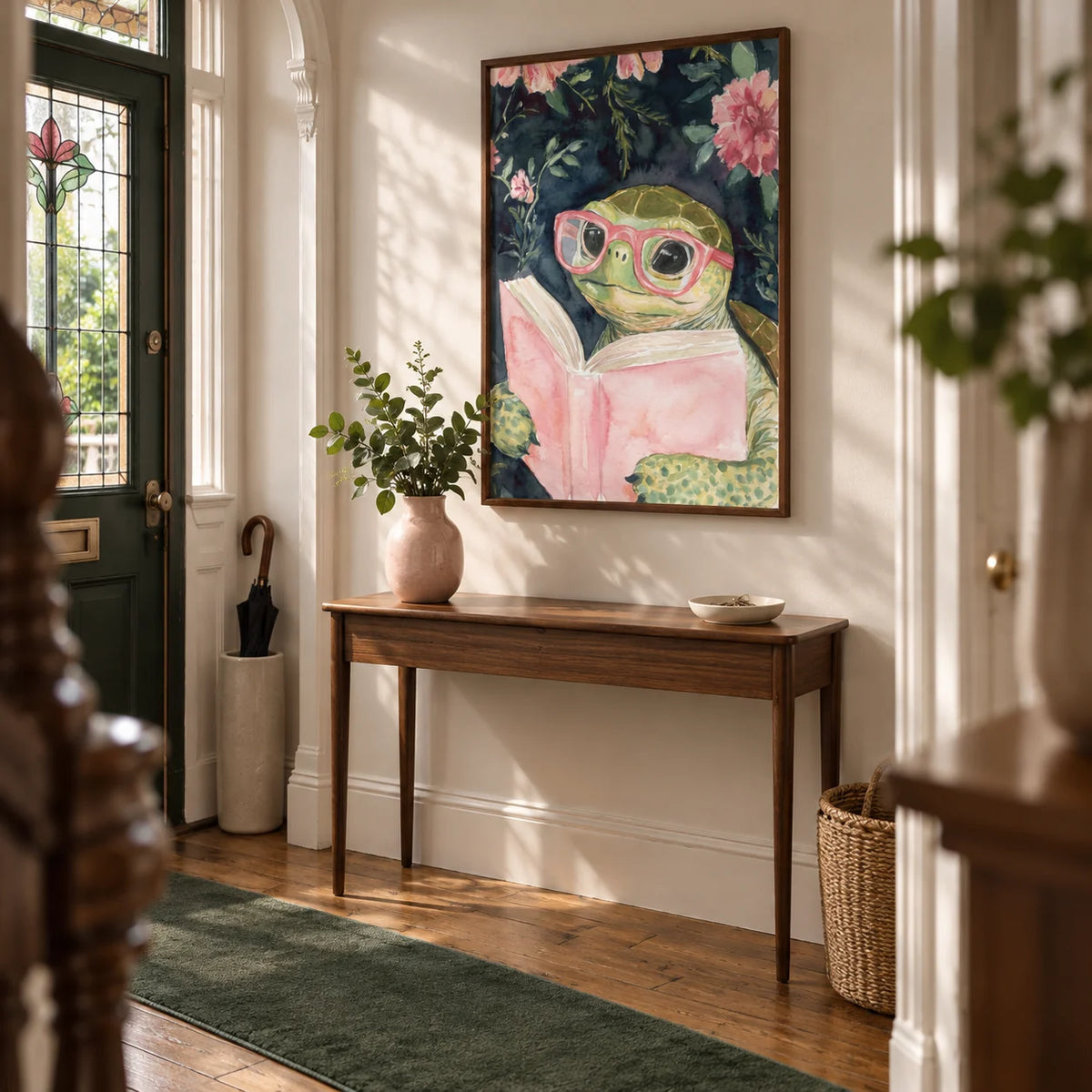 Turtle Reading Art Print, framed on the wall of a welcoming hallway in a Victorian UK terrace with a soft warm white wall and timber floorboards