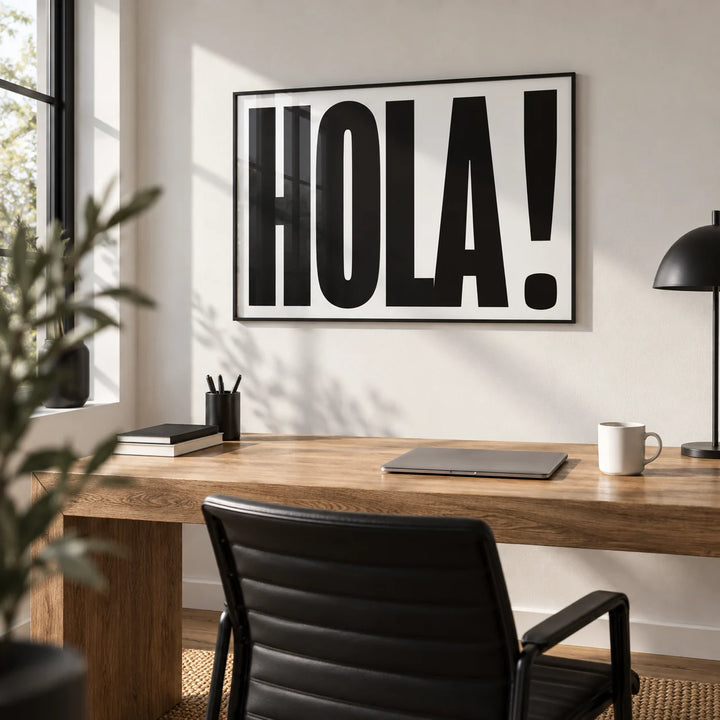 Typographic Posters, framed on the wall of a monochrome home office