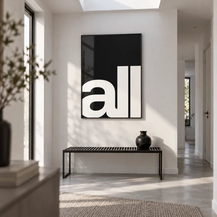 Typography Art Prints, framed on the wall of a crisp white hallway in a modern flat with a pale grey floor