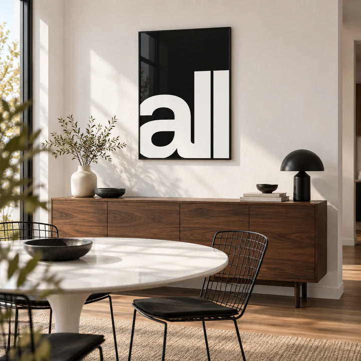 Typography Art Prints, framed on the wall of a modern dining room with a white wall