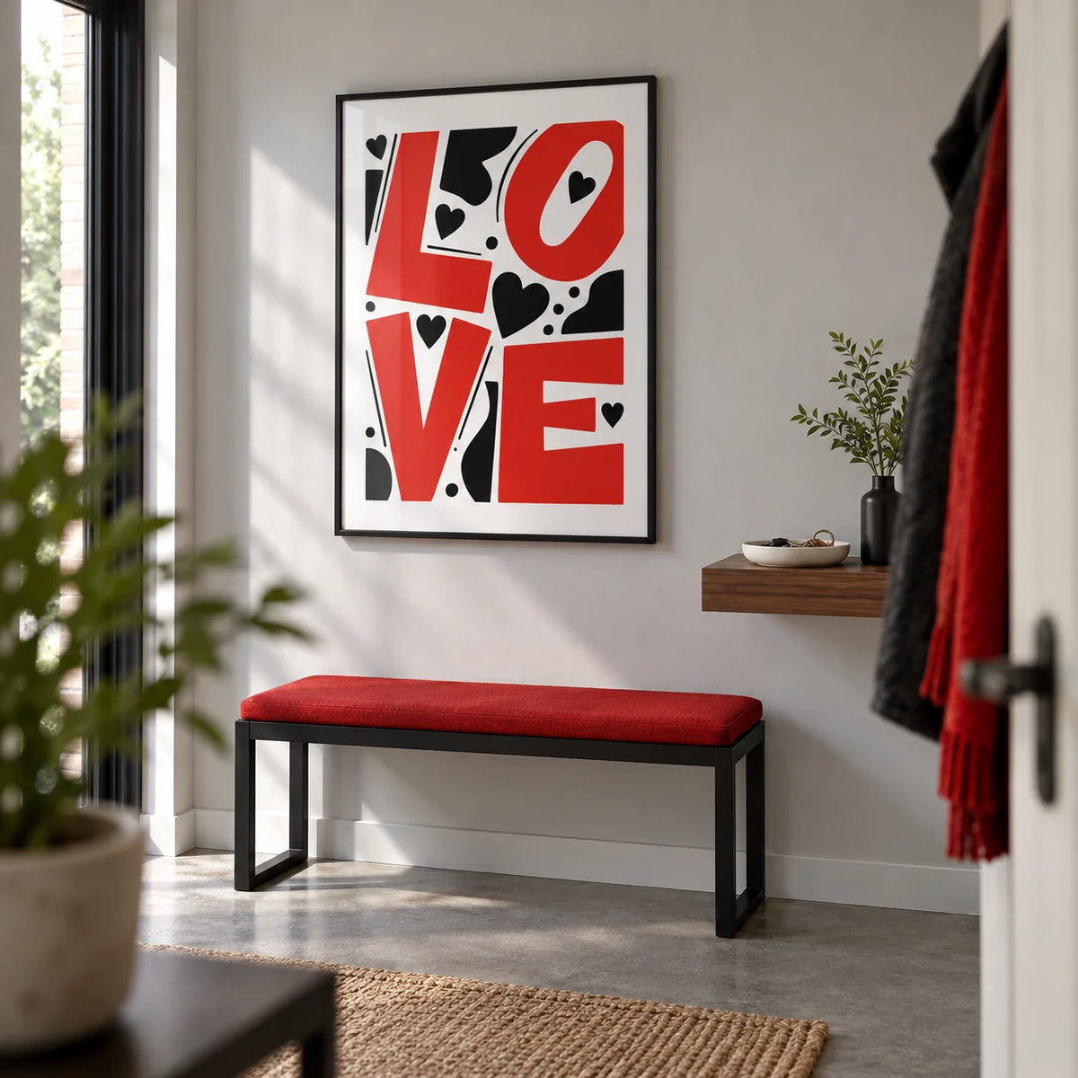 Typography Love Poster, framed on the wall of a crisp entrance hallway in a renovated UK flat with a pale grey wall and a smooth concrete floor