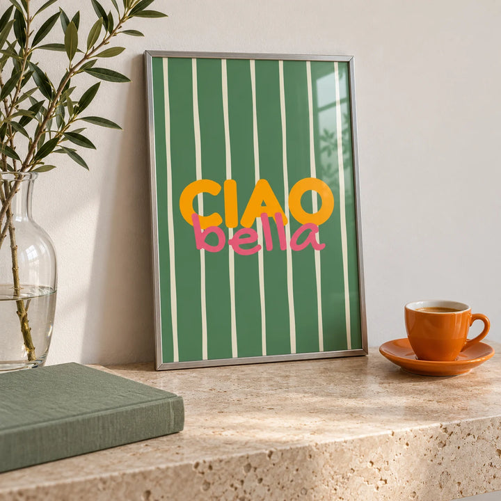 Typography Wall Art, a small A4 framed print leaning on a travertine side table in a hallway