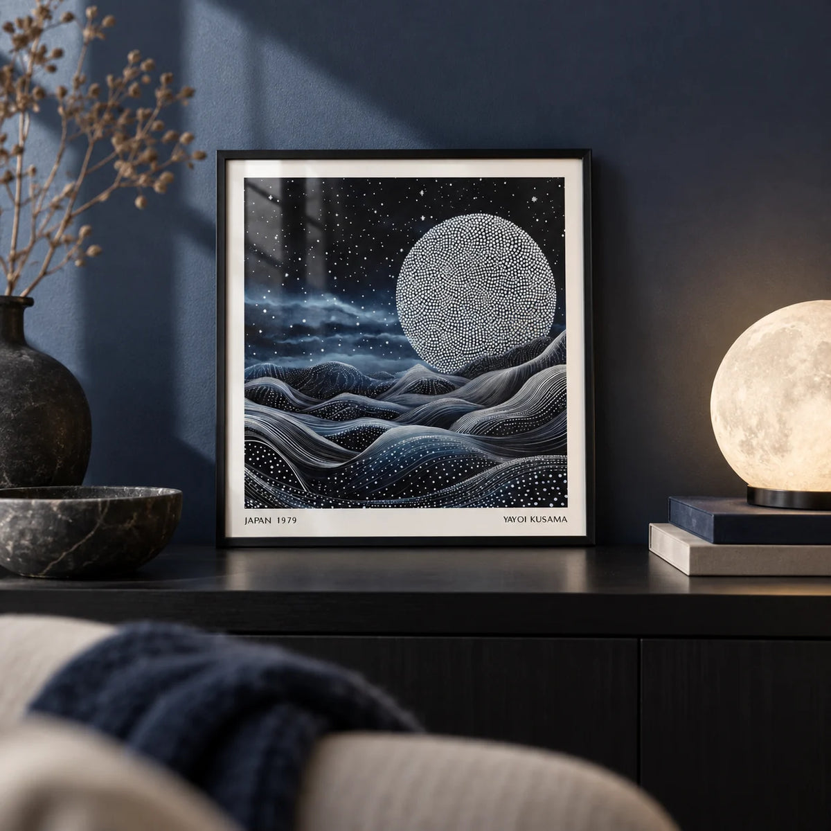 Unique Wall Art for Bedroom, a small A4 framed print leaning on a black shelf in a living room
