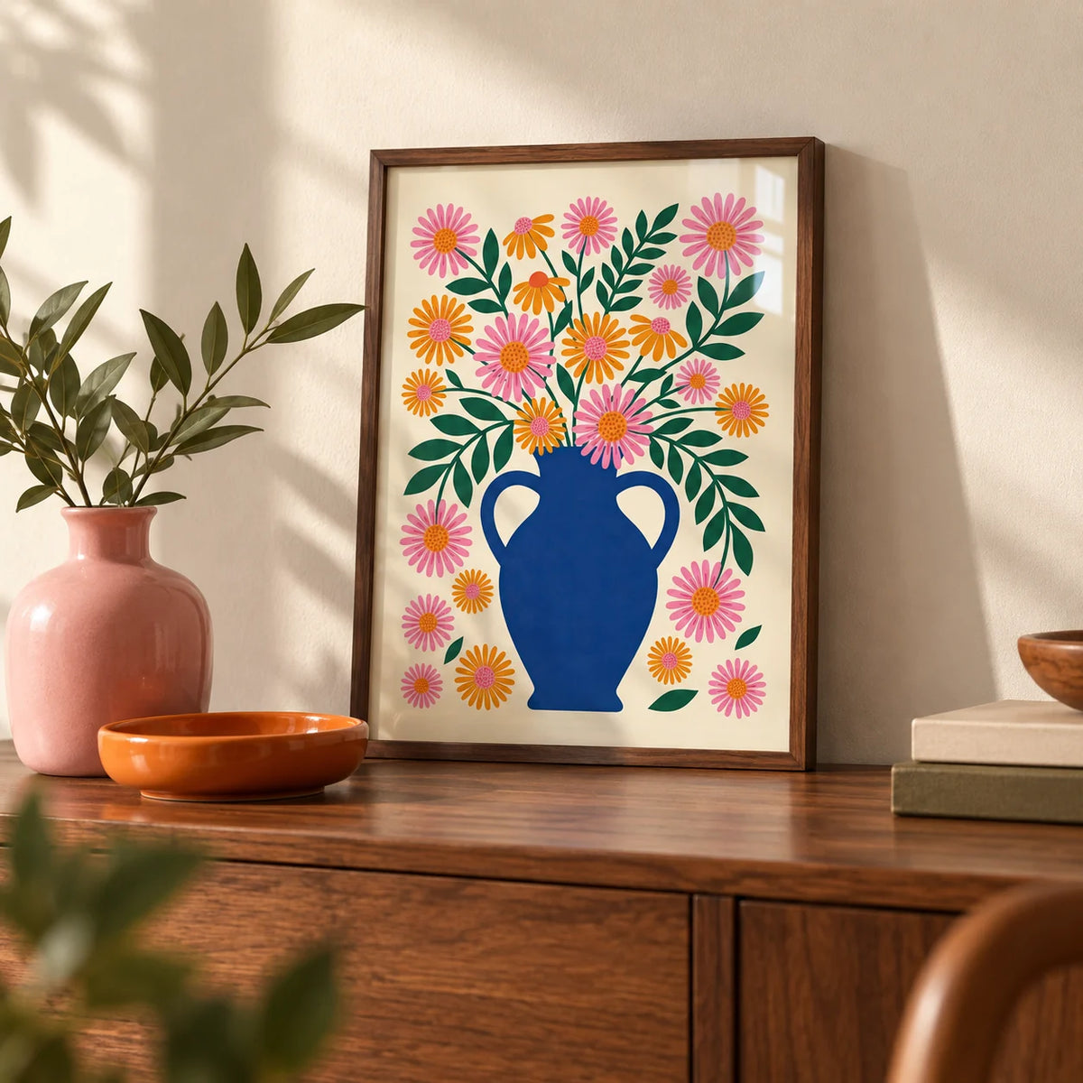 Vase Art Print, a small A4 framed print leaning on a walnut sideboard in a living room