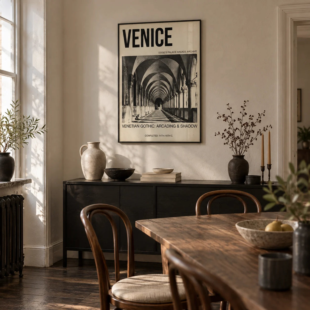 Venetian Gothic Wall Art, framed on the wall of a compact dining room in a characterful city flat with ivory plaster walls and dark floorboards