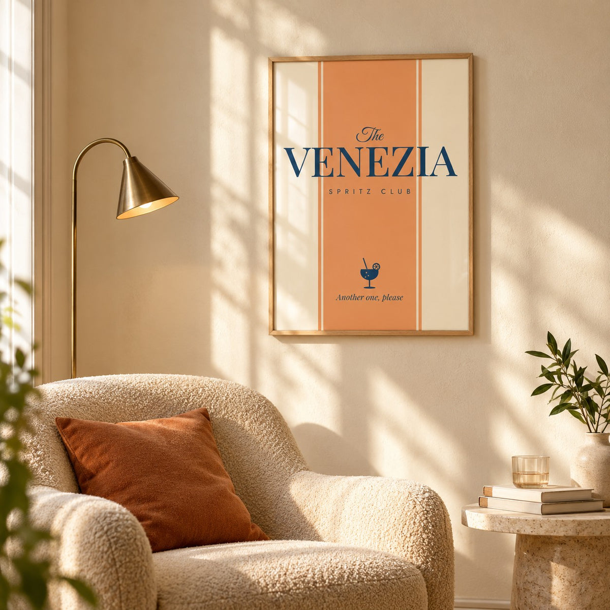 Venezia Print hung above a boucle armchair in a reading corner (frame not included)