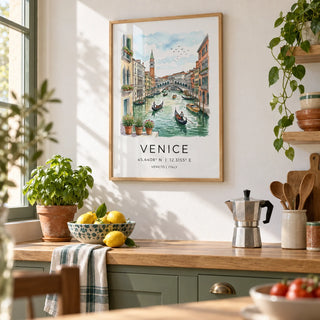 Venice Canal Art Print, framed on the wall of a bright Italian-style kitchen with a white wall