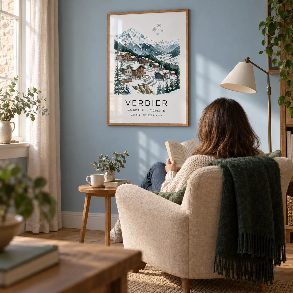 Verbier Mountain Wall Art, framed on the wall of a cosy reading corner in a UK country home with a pale blue wall and oak floorboards in a living room